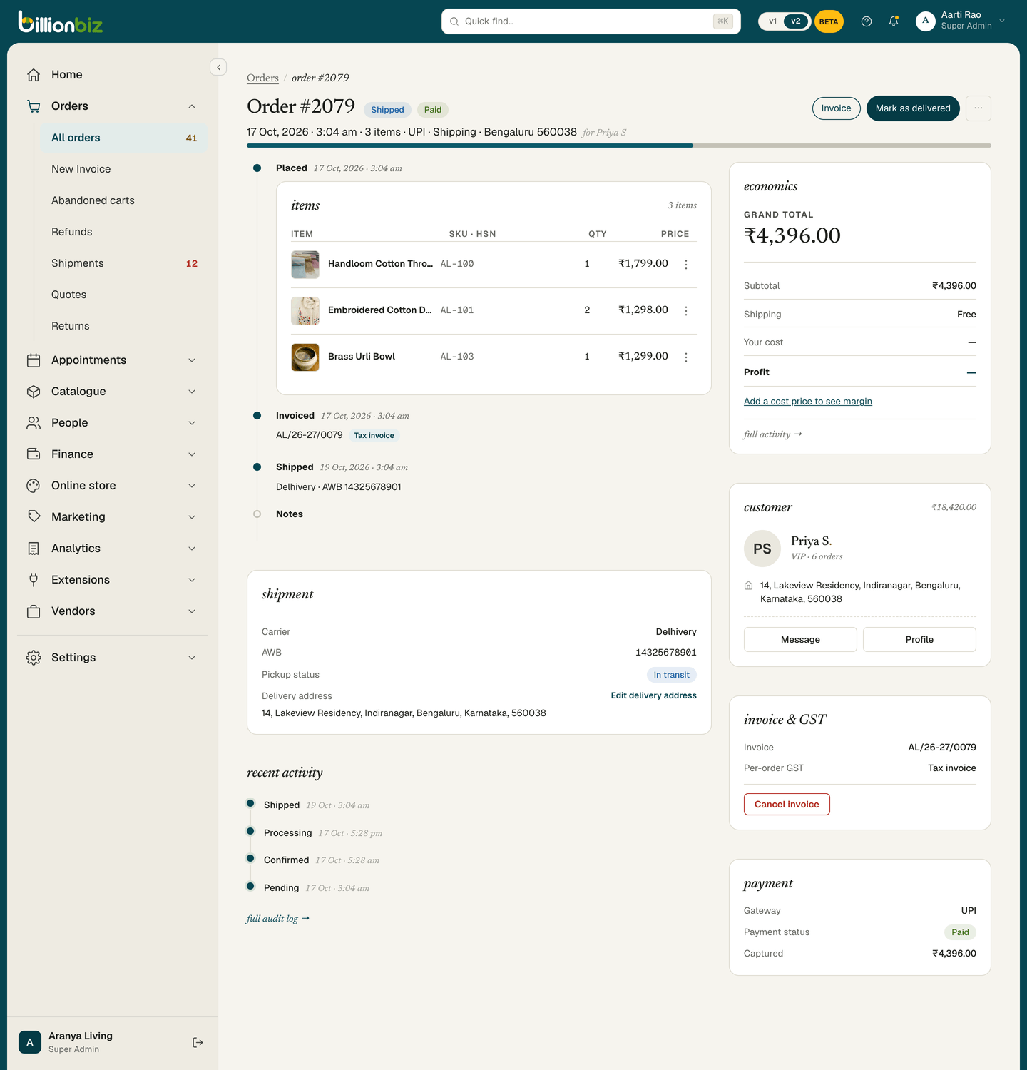 BillionBiz order detail showing payment status, invoice and a Delhivery shipment